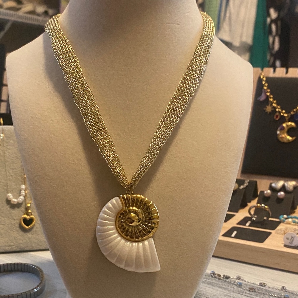Elegant Gold and White Nautilus Pendant Necklace